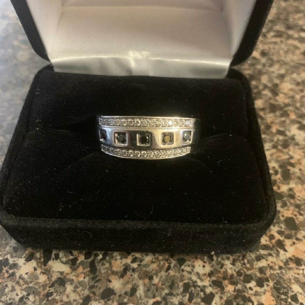 Men's size 11 5/7 ct white gold. Black diamonds
